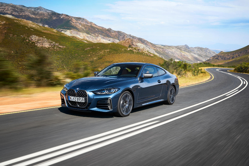 2023-bmw-4-series-coupe-driving-front-angle-carbuzz-715601-1600.jpg