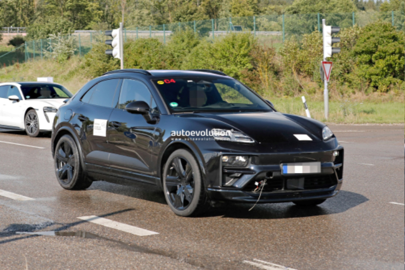 2024-porsche-macan-ev-prototype-shows-coupe-roofline-dual-motor-powertrain-offers-603-hp_4.jpg